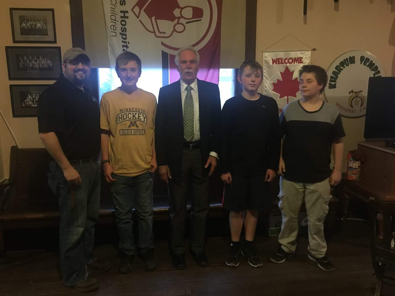 Ivanhoe Chapter DeMolay and Chapter Dad with Sr DeMolay, Ed Schafer, former US Sec of Agriculture, former Governor of ND, and interim President of UND.
